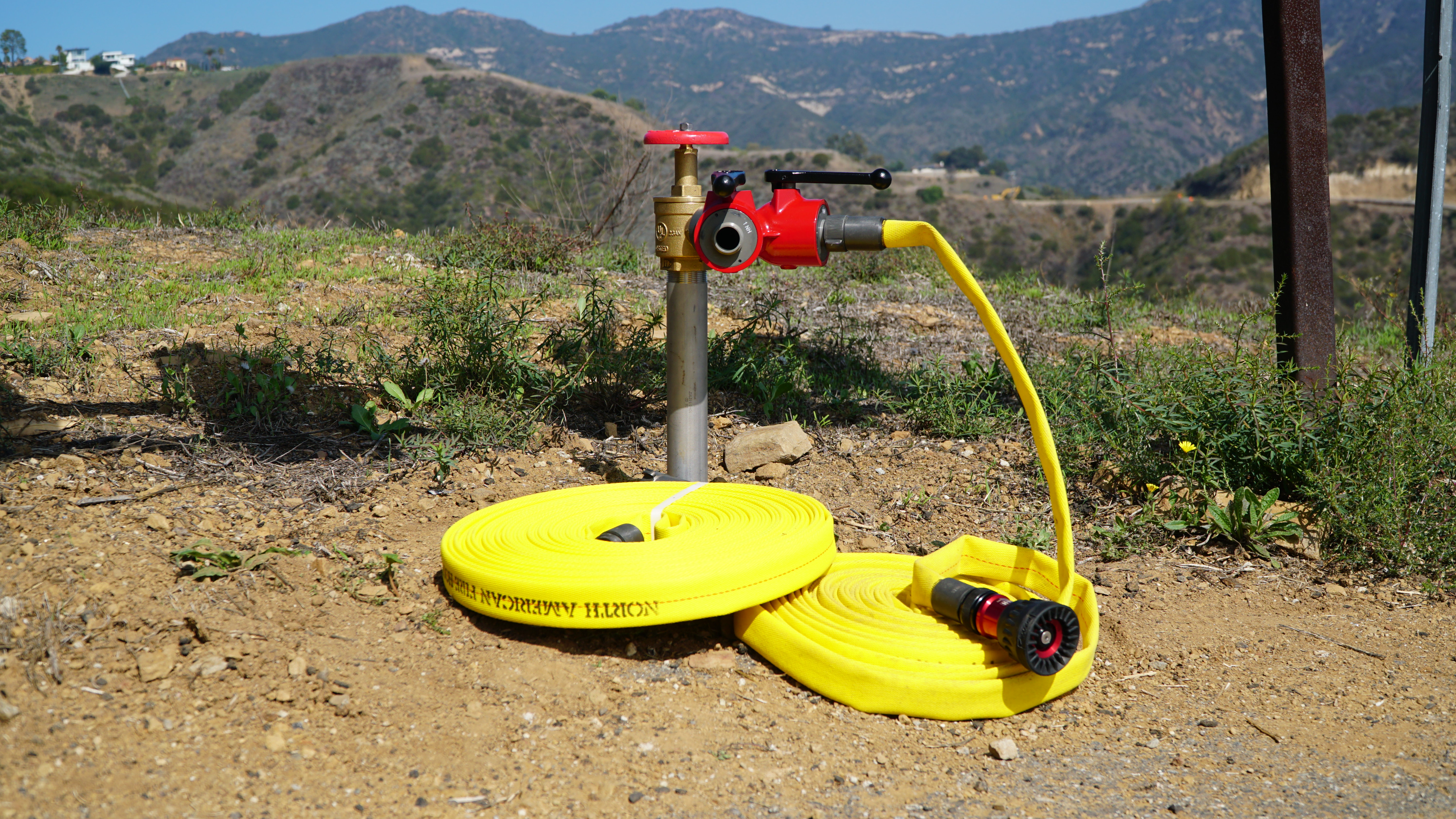 Hainy Hydrant installed in Malibu hills with fire hoses ready